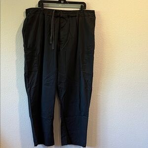 Men’s black Landow scrub pants. Zip fly, and drawstring closure.